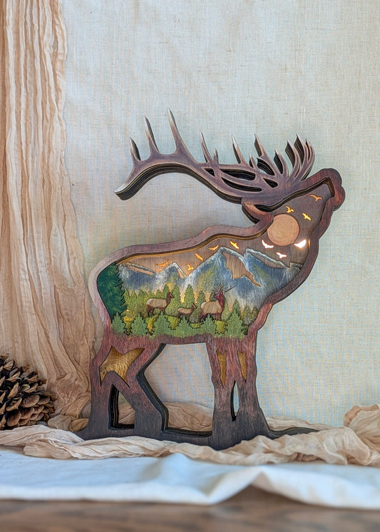 3D Elk Nightlight with Hand Painted Scene displayed with the light on