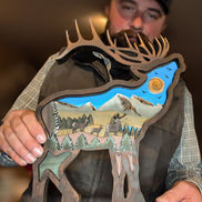 Workshop Participant with Painted and Finished 3D Layered Elk