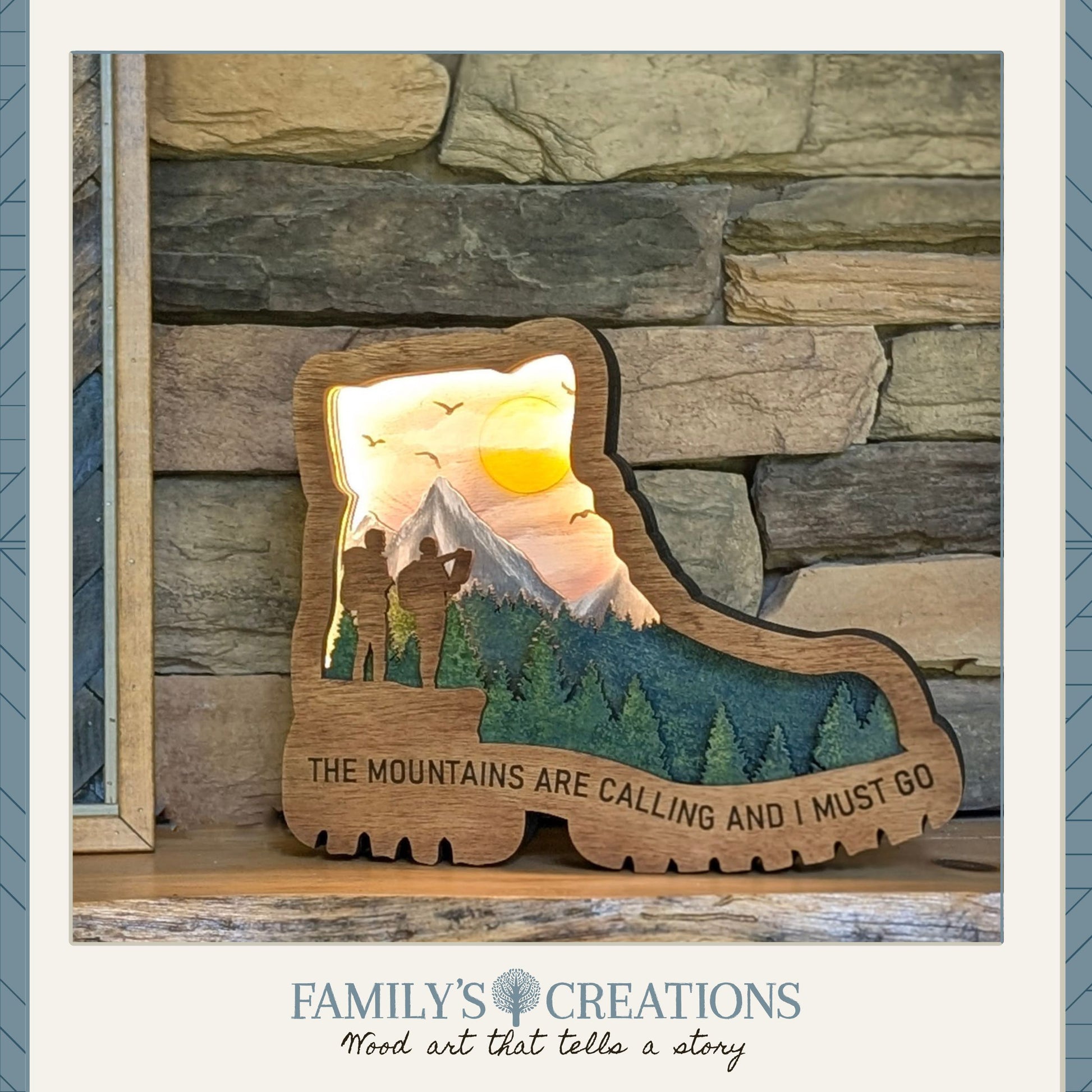 Hiking Boot "The Mountains Are Calling and I Must Go" Featured with the Light On displayed on a mantle