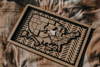 Hearthline Series wooden USA map showing peel-and-stick state pieces ready to place, designed for tracking travel memories one state at a time.