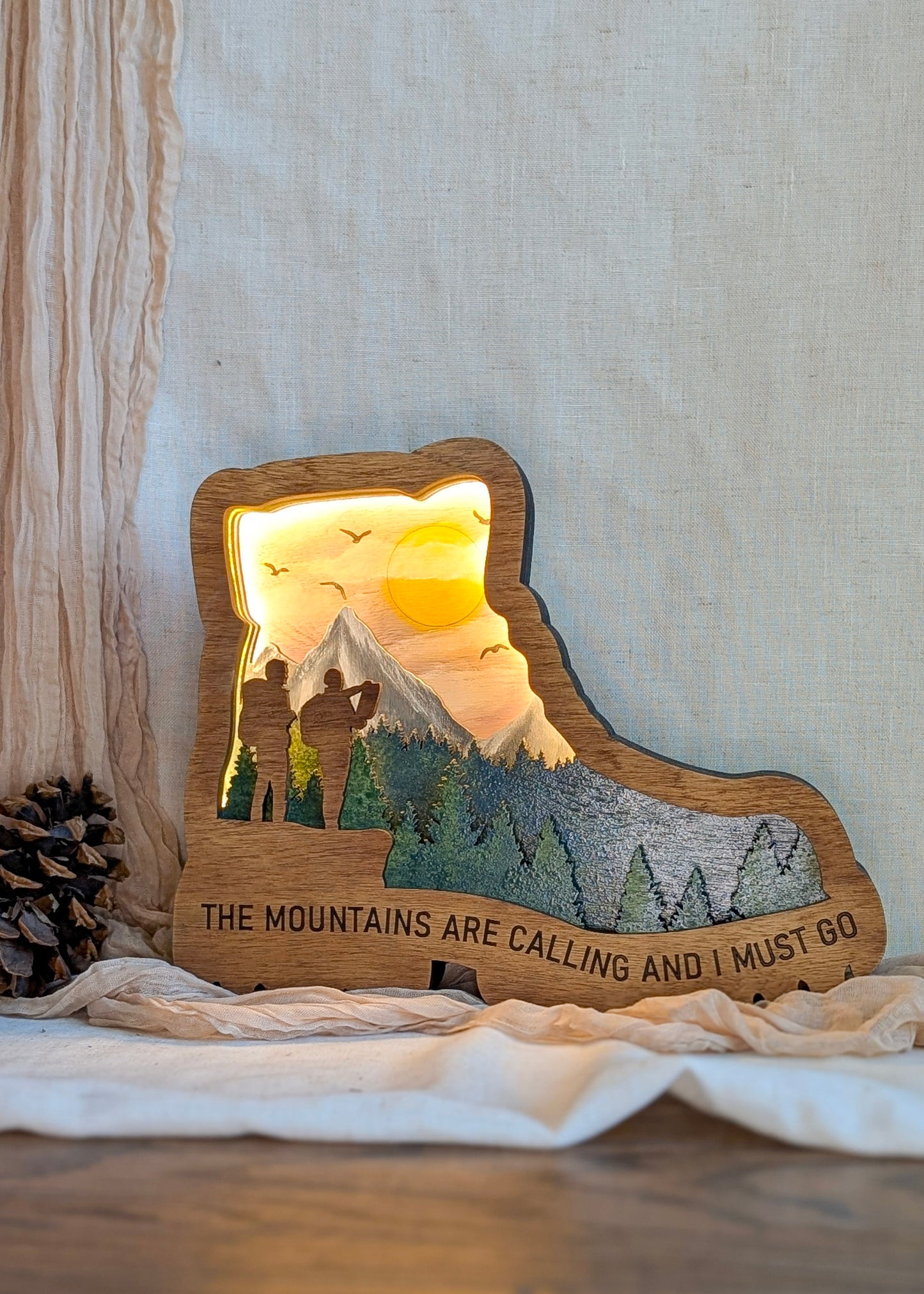 Hiking Boot "The Mountains Are Calling and I Must Go" Featured with the Light On