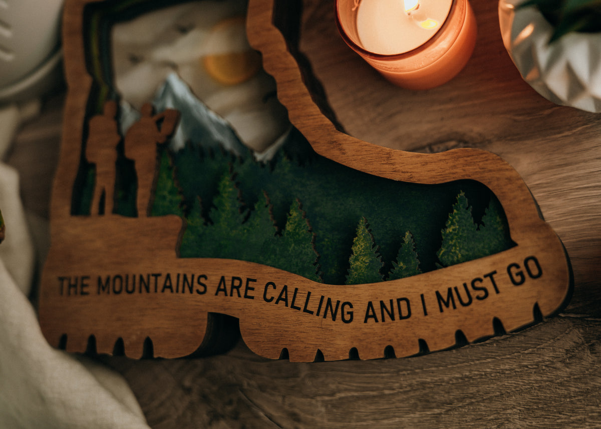 Trail Worn & Glowing – Illuminated Layered Hiking Boot Artwork