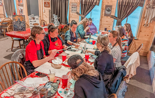 Workshop participants painting